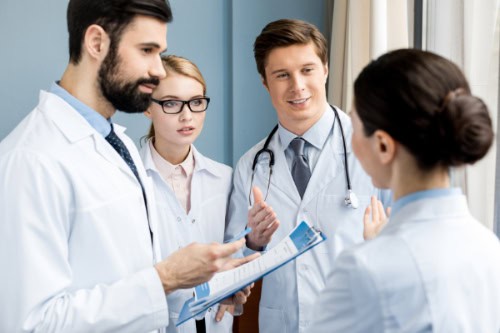 SRC nursing assistants talking to the medical team, providing advice and care.