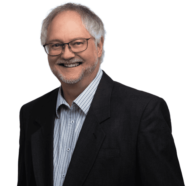 Professional man in a suit, smiling, for creative training.